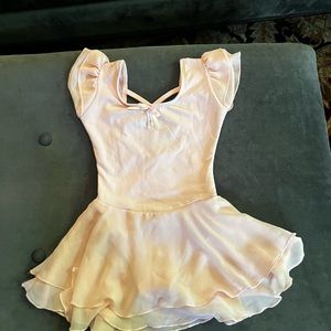 Child ballet pink dance leotard/attached skirt. About size 4-5. Like new.